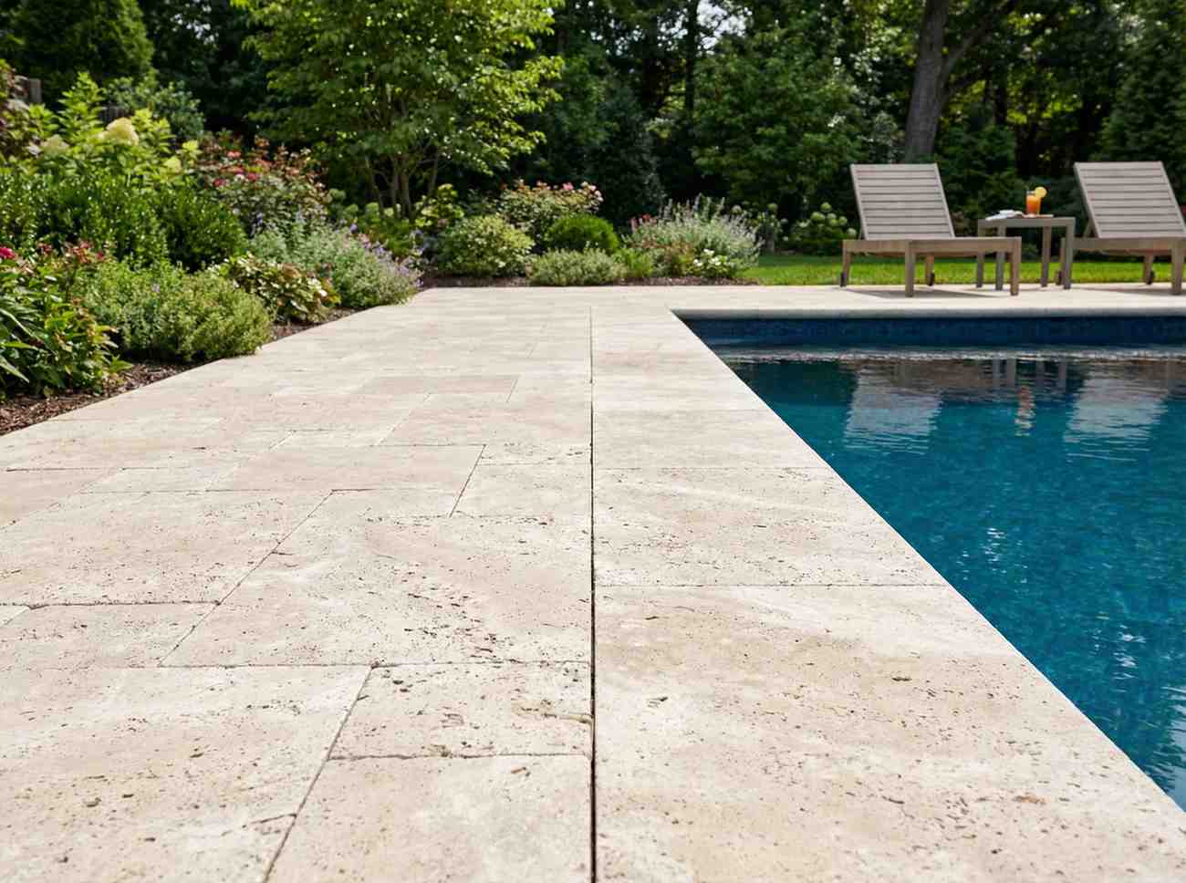travertine used for pool coping around a rectangular pool